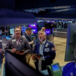 Traders on the New York Stock Exchange as technology stocks rebound