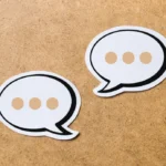 Messaging bubbles representing AI agents inside text conversations