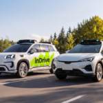 inDrive and Pony.ai branded vehicles on a road