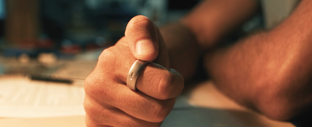 Close-up of a person wearing the Interface smart ring
