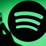 Spotify logo displayed on a phone